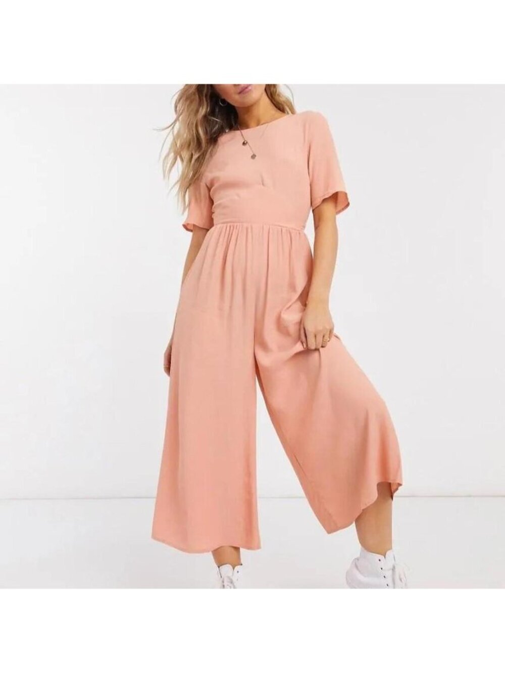Peach jumpsuit with wide leg and open back